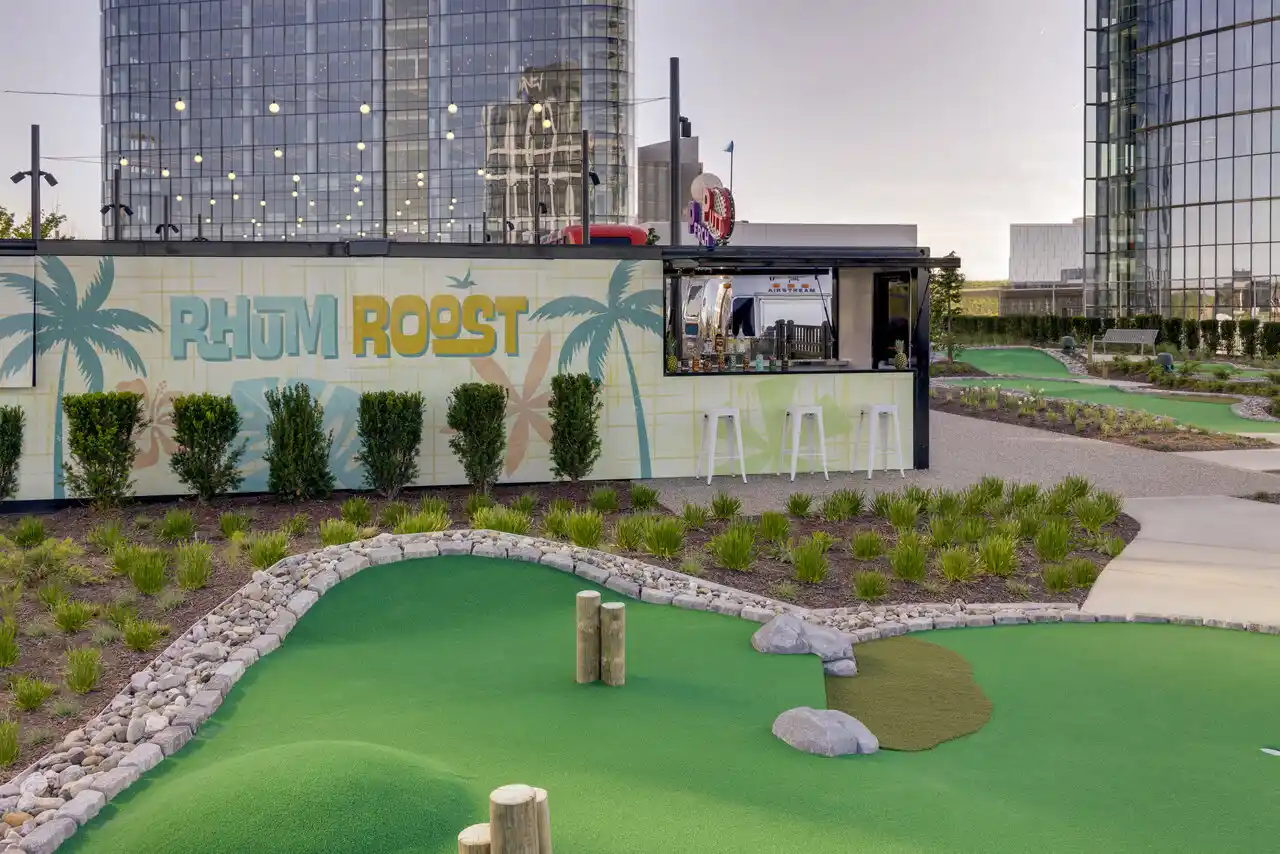 Rhum Roost beside the Perch Putt rooftop mini golf course